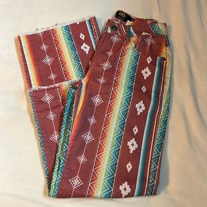 Multi-colored lucky and blessed size 6 bootcut jeans.